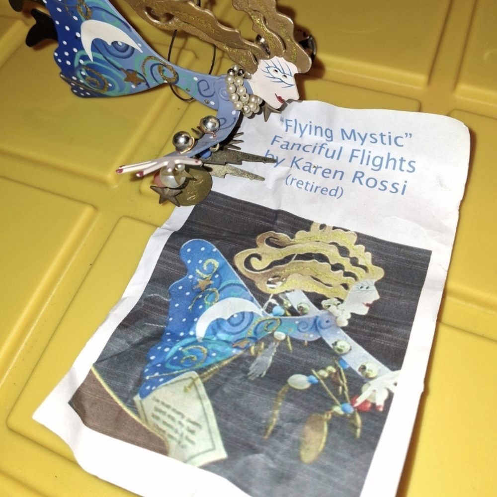 Retired Karen Rossi Flying Mystic Ornament